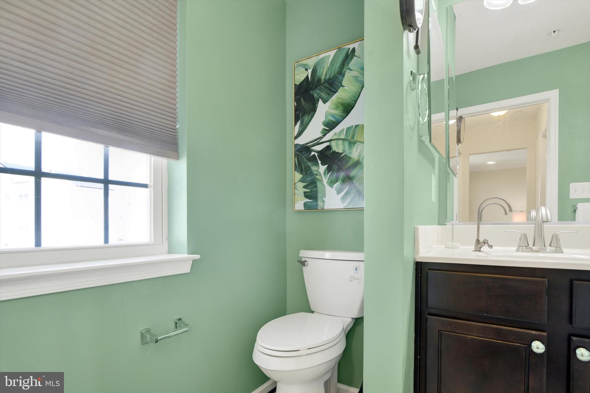 637 Bentgrass Drive Aberdeen, MD 21001 - Photo 17 of 35 a bathroom with a toilet sink and mirror