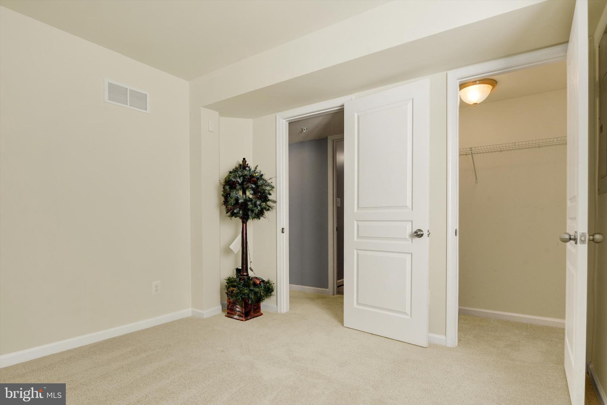 637 Bentgrass Drive Aberdeen, MD 21001 - Photo 32 of 35 an empty room with windows and plants