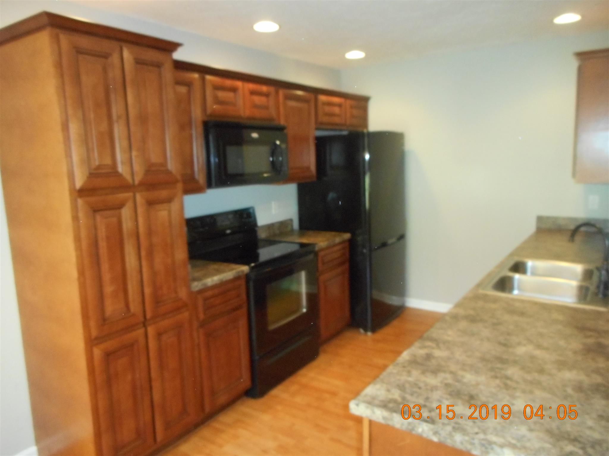 Lots of cabinet space in kitchen.