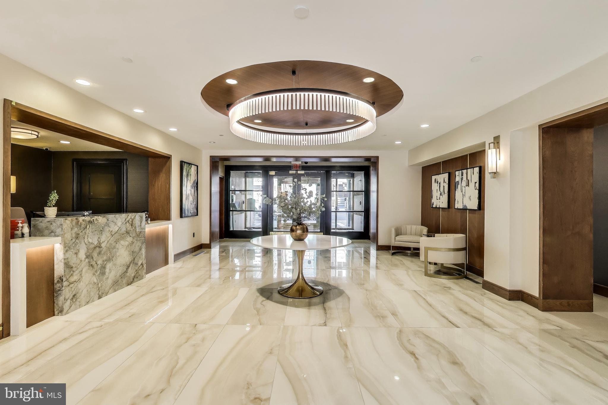 616 E Street Northwest, Unit 648 Washington, DC 20004 - Photo 20 of 39 a view of a living room and a large window