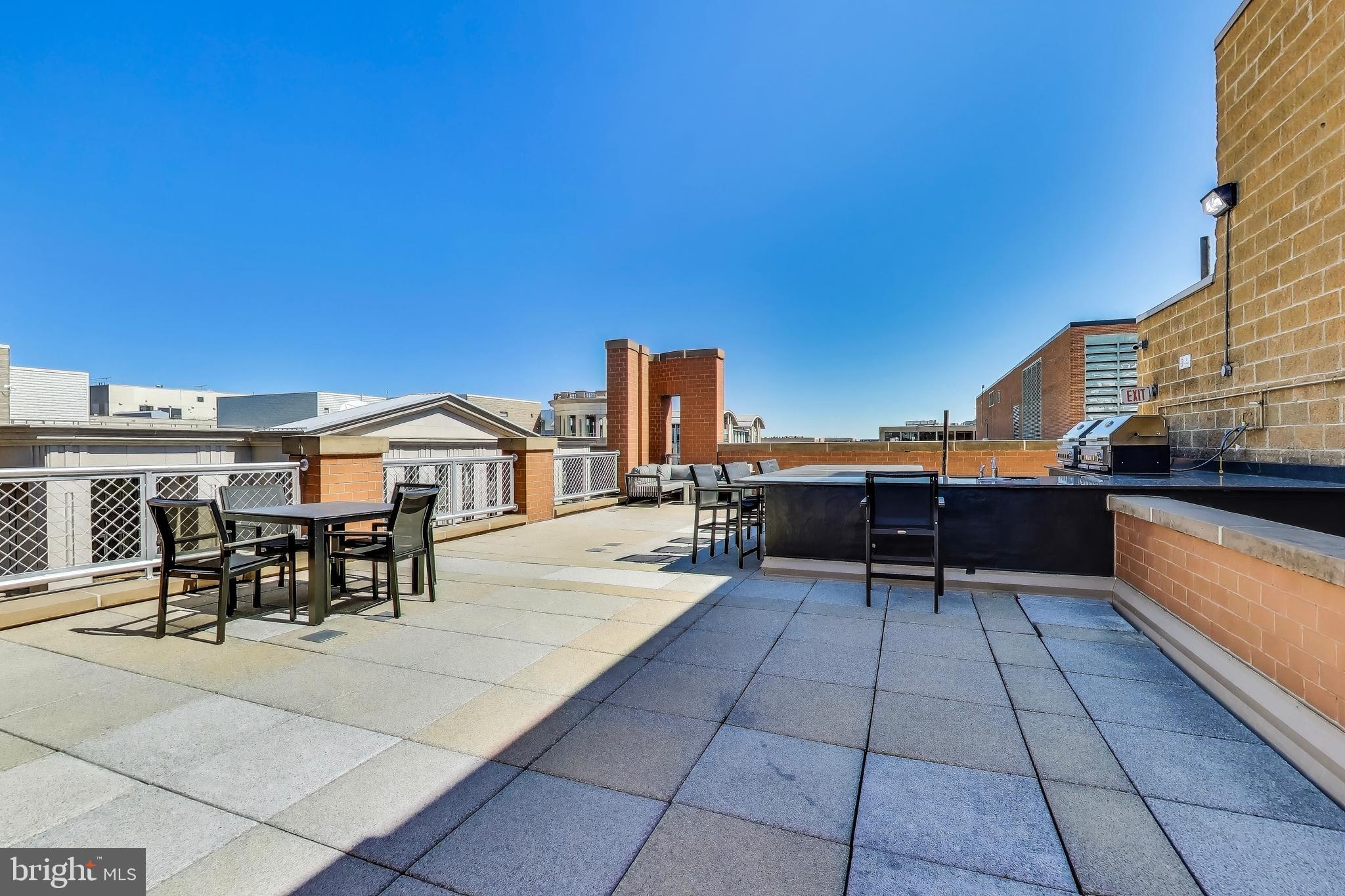 616 E Street Northwest, Unit 648 Washington, DC 20004 - Photo 26 of 39 a view of a terrace with chairs