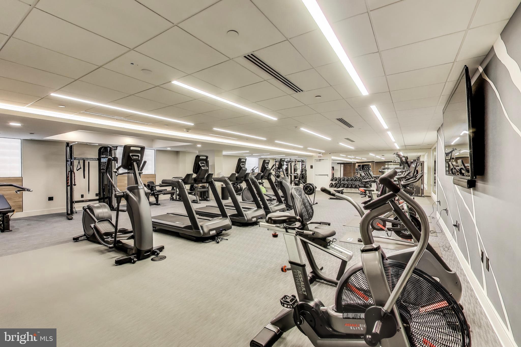 616 E Street Northwest, Unit 648 Washington, DC 20004 - Photo 28 of 39 a view of a room with gym equipment