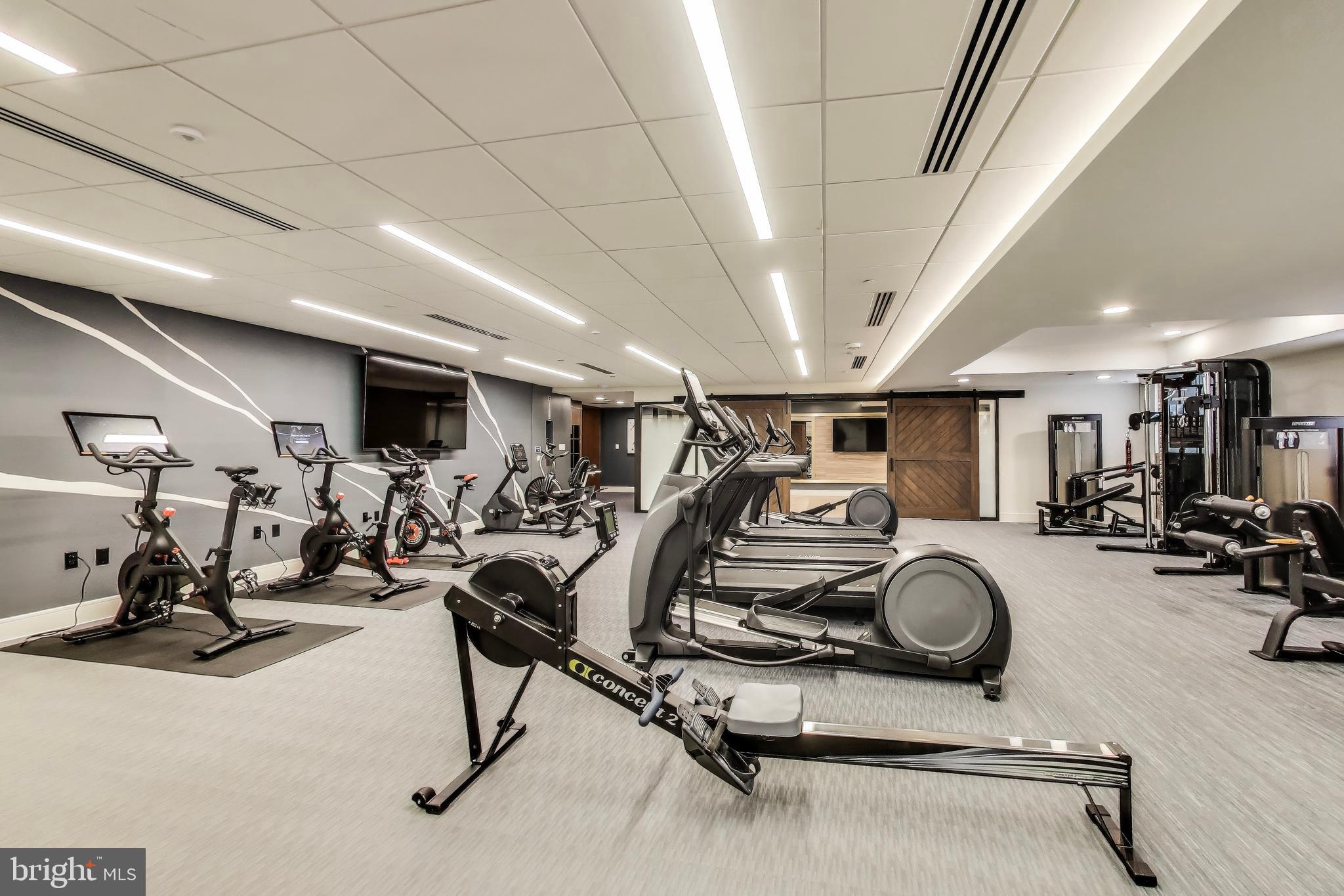 616 E Street Northwest, Unit 648 Washington, DC 20004 - Photo 29 of 39 a view of a room with gym equipment