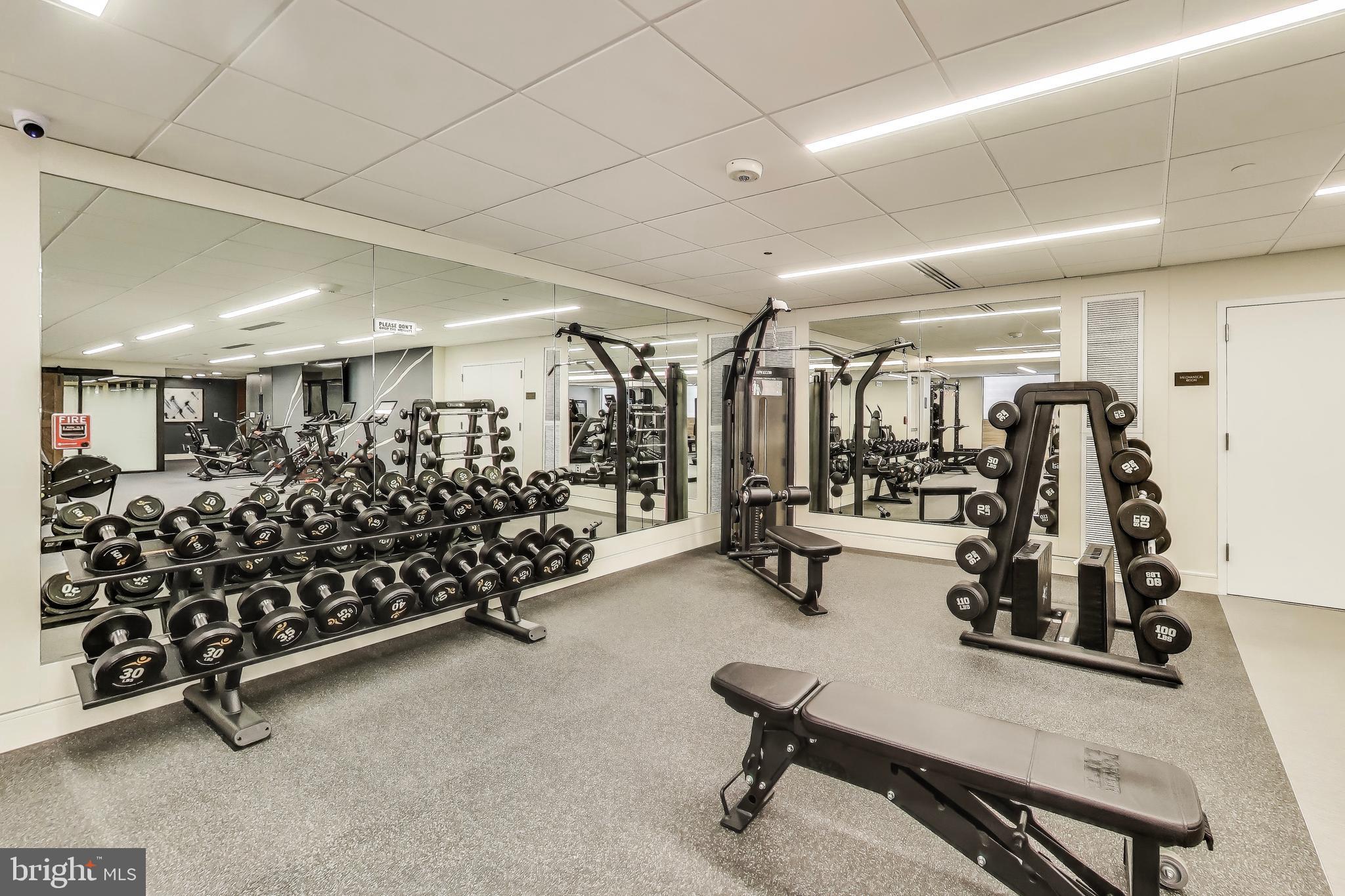 616 E Street Northwest, Unit 648 Washington, DC 20004 - Photo 30 of 39 a view of a room with gym equipment