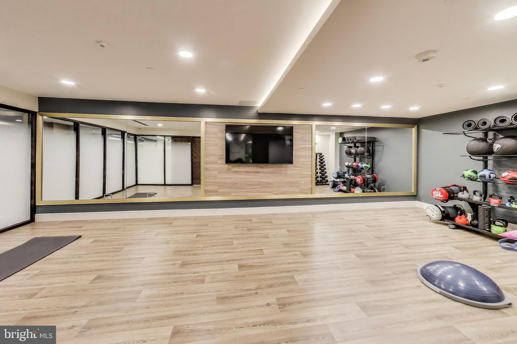 616 E Street Northwest, Unit 648 Washington, DC 20004 - Photo 31 of 39 a view of a room with gym equipment