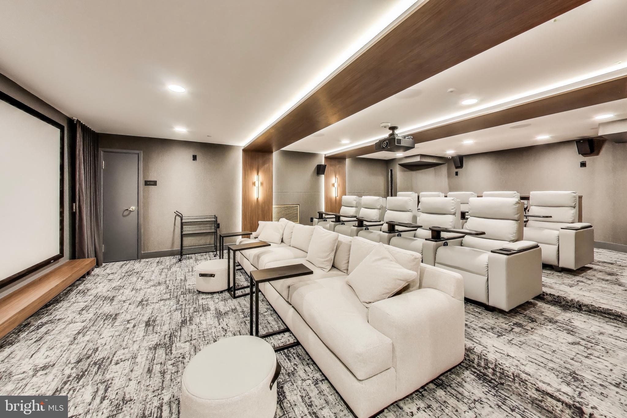 616 E Street Northwest, Unit 648 Washington, DC 20004 - Photo 33 of 39 a living room with furniture and a large window