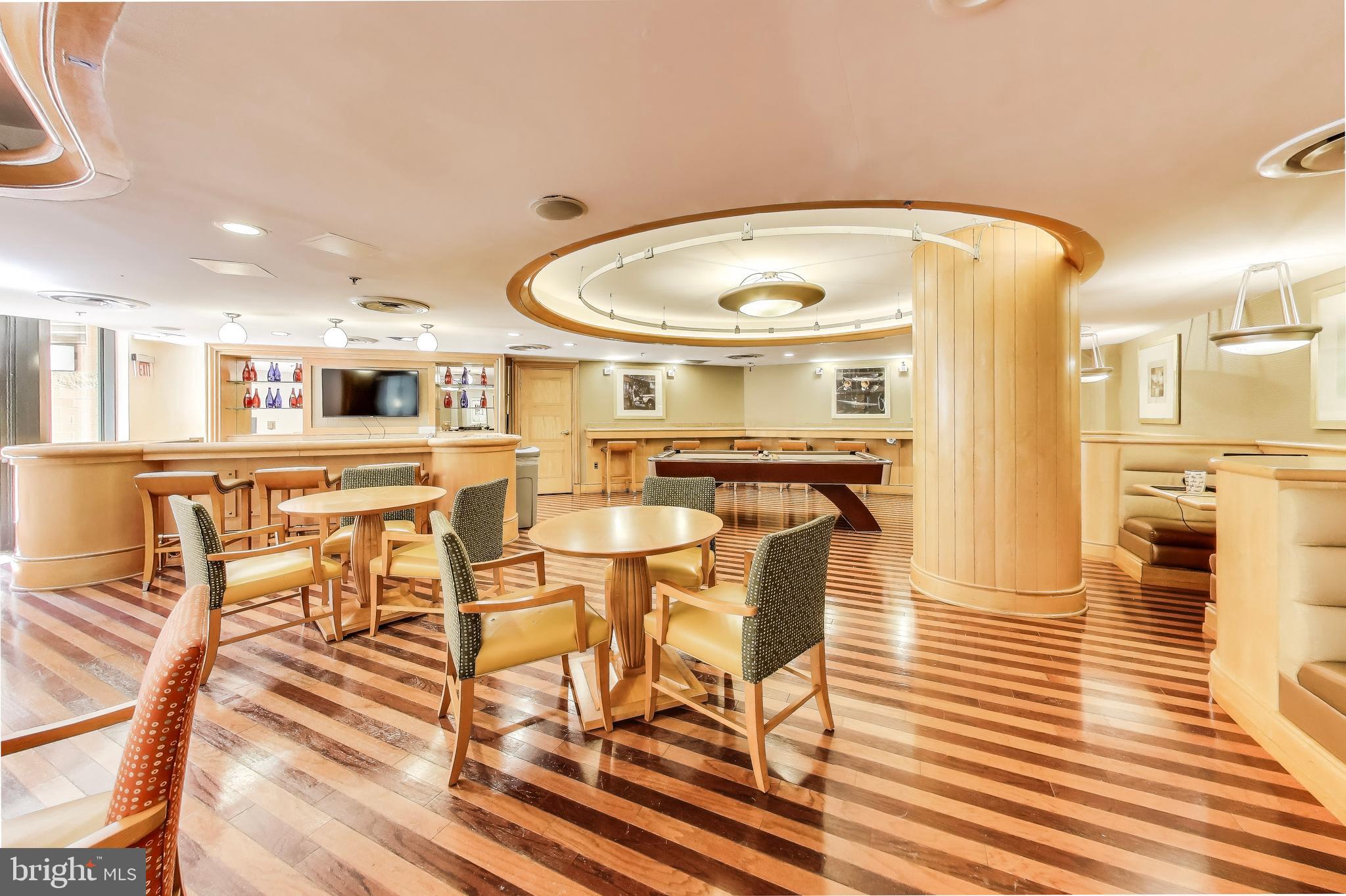 616 E Street Northwest, Unit 648 Washington, DC 20004 - Photo 35 of 39 a view of a swimming pool with seating area