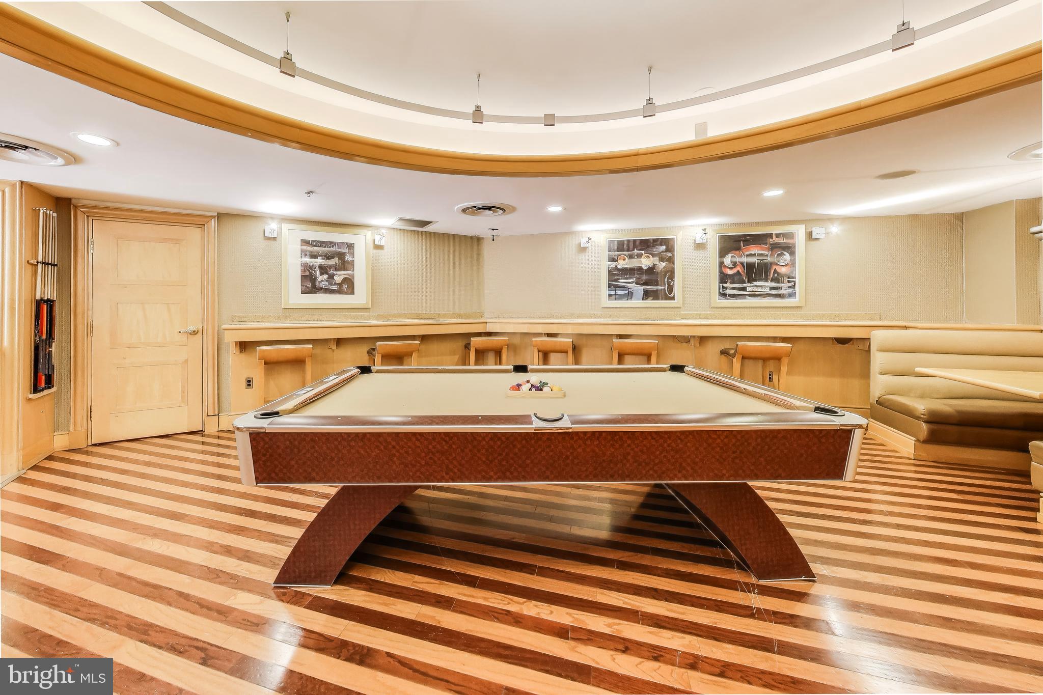 616 E Street Northwest, Unit 648 Washington, DC 20004 - Photo 36 of 39 a room with pool table and wooden floor