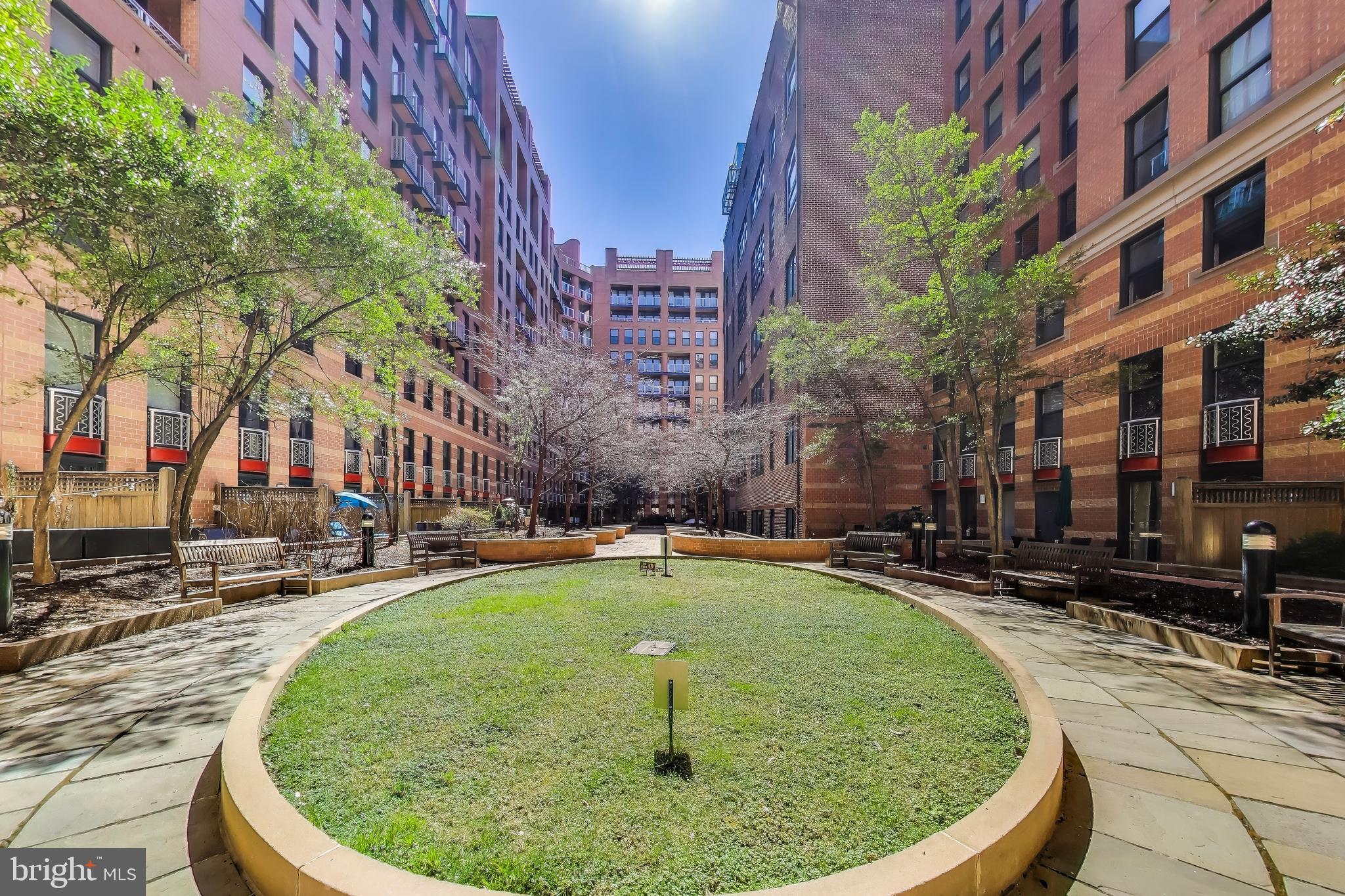 616 E Street Northwest, Unit 648 Washington, DC 20004 - Photo 38 of 39 a view of a swimming pool with a sitting area