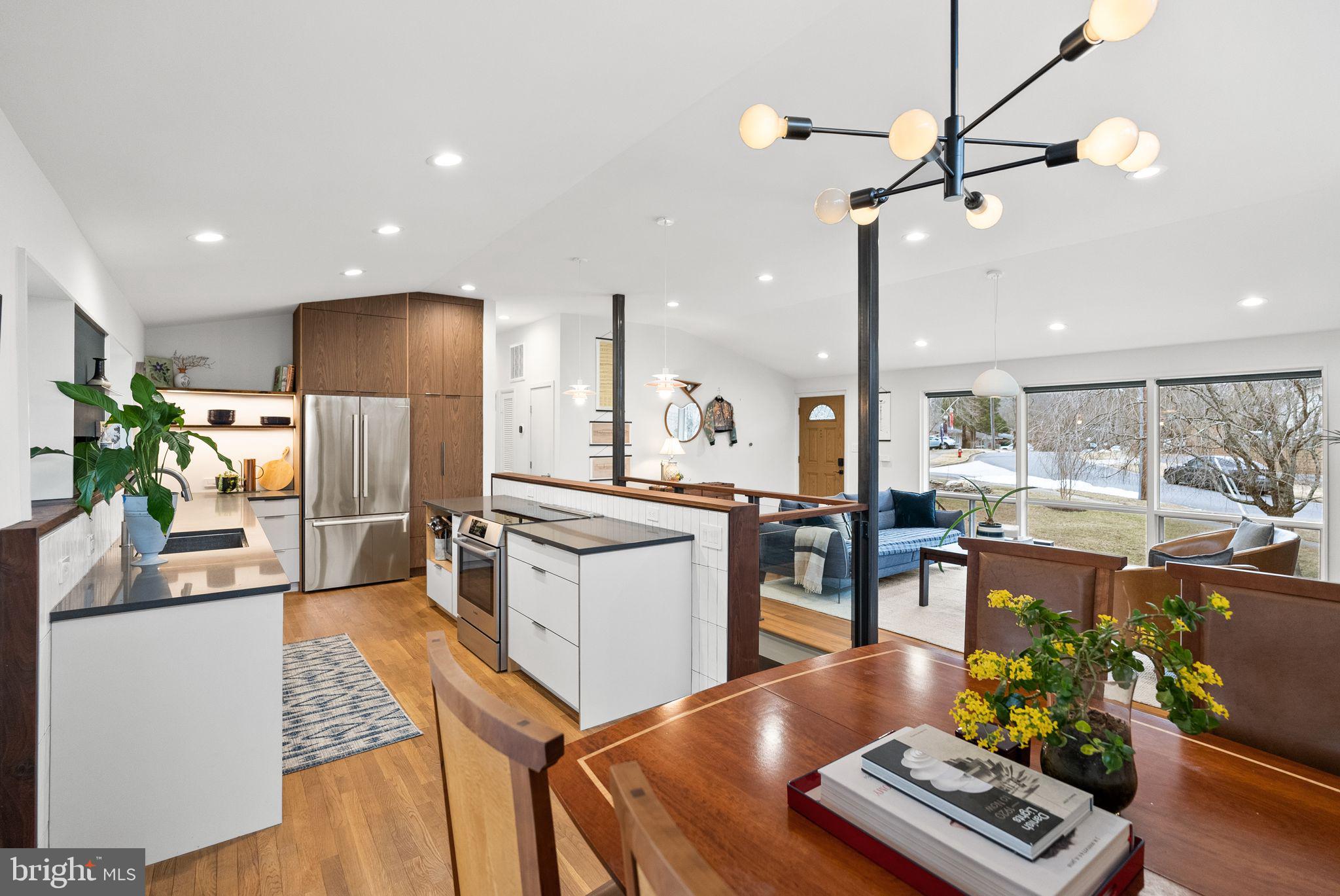 7405 Add Drive Falls Church, VA 22042 - Photo 11 of 74 a large kitchen with a table and chairs in it