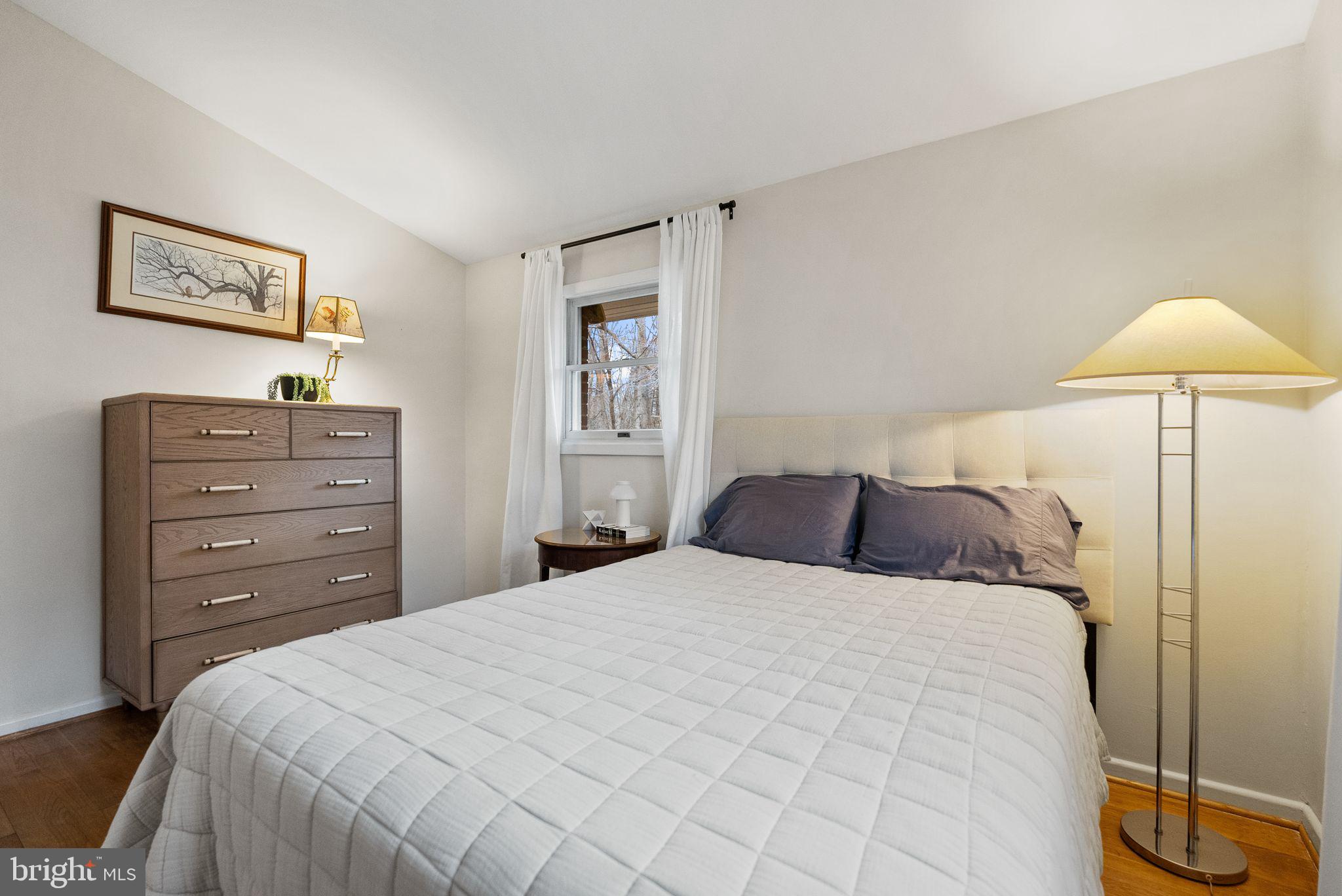 7405 Add Drive Falls Church, VA 22042 - Photo 22 of 74 a bedroom with a bed and a lamp