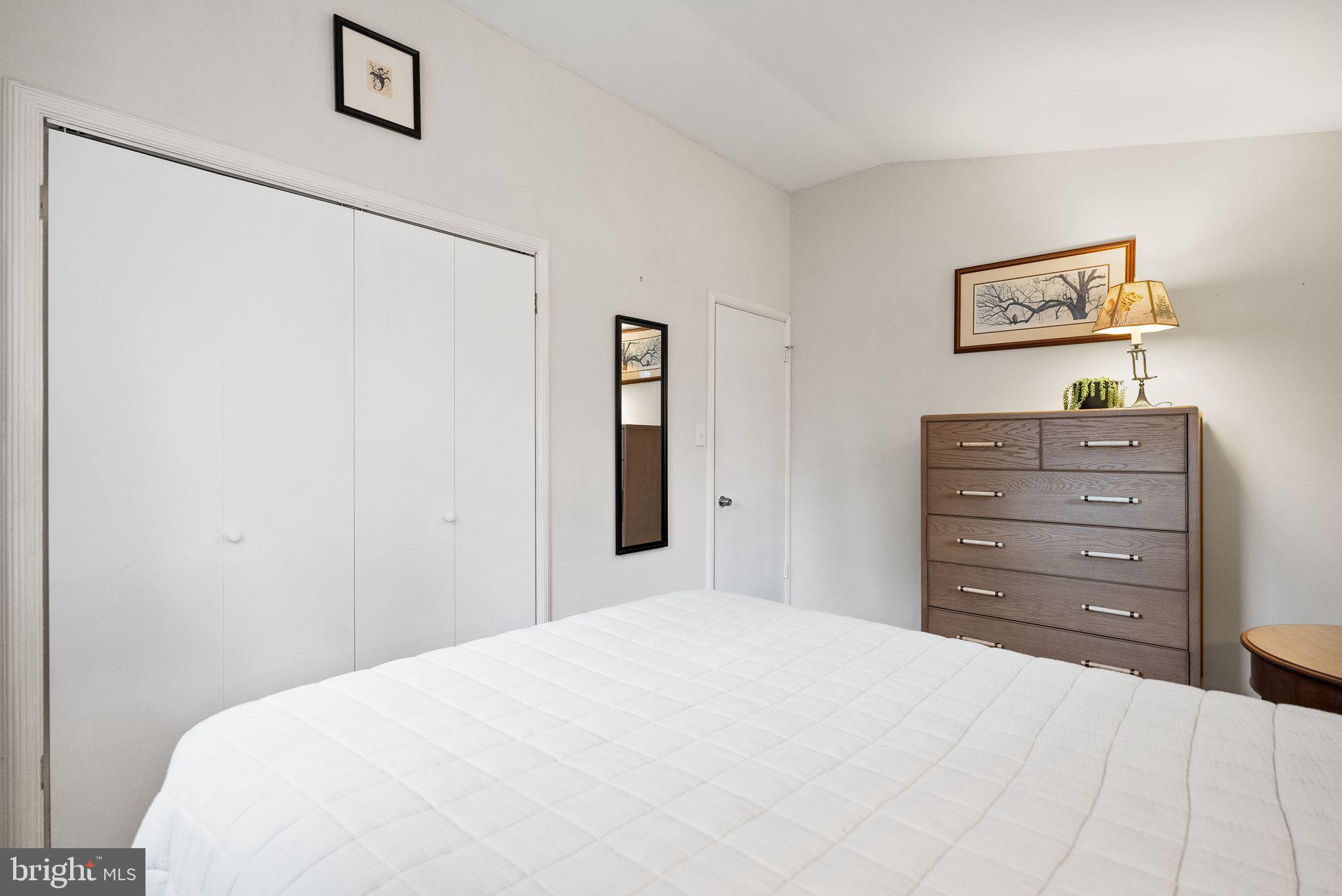 7405 Add Drive Falls Church, VA 22042 - Photo 23 of 74 a bedroom with a bed and a dresser