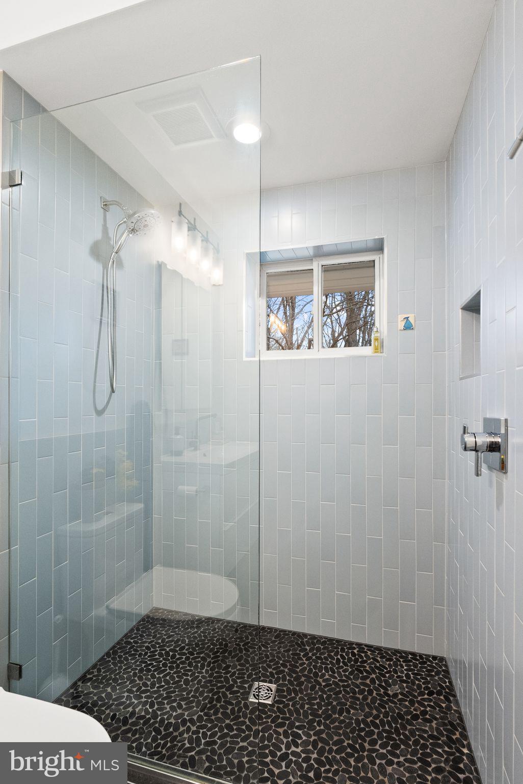 7405 Add Drive Falls Church, VA 22042 - Photo 25 of 74 a bathroom with a shower