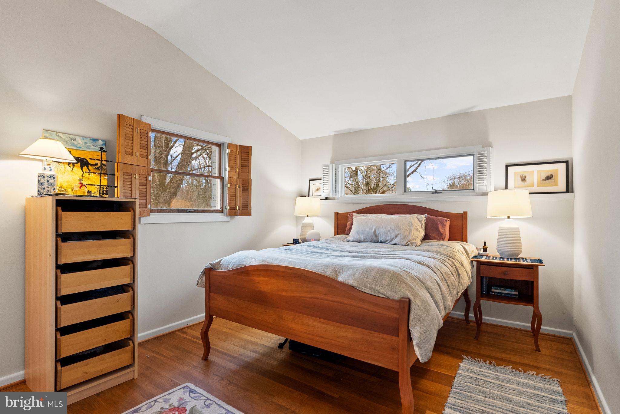7405 Add Drive Falls Church, VA 22042 - Photo 26 of 74 a bedroom with a bed and wooden floor