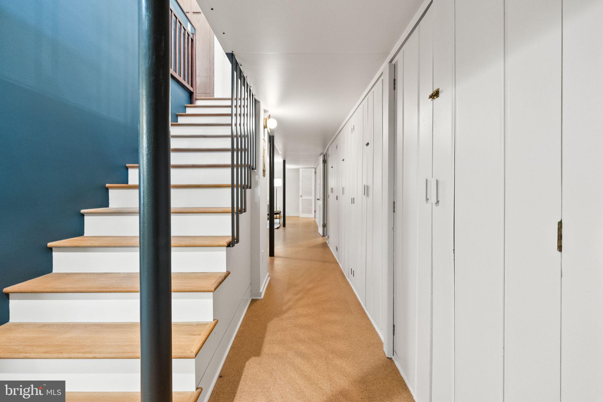 7405 Add Drive Falls Church, VA 22042 - Photo 32 of 74 a view of a hallway with wooden floor and entryway