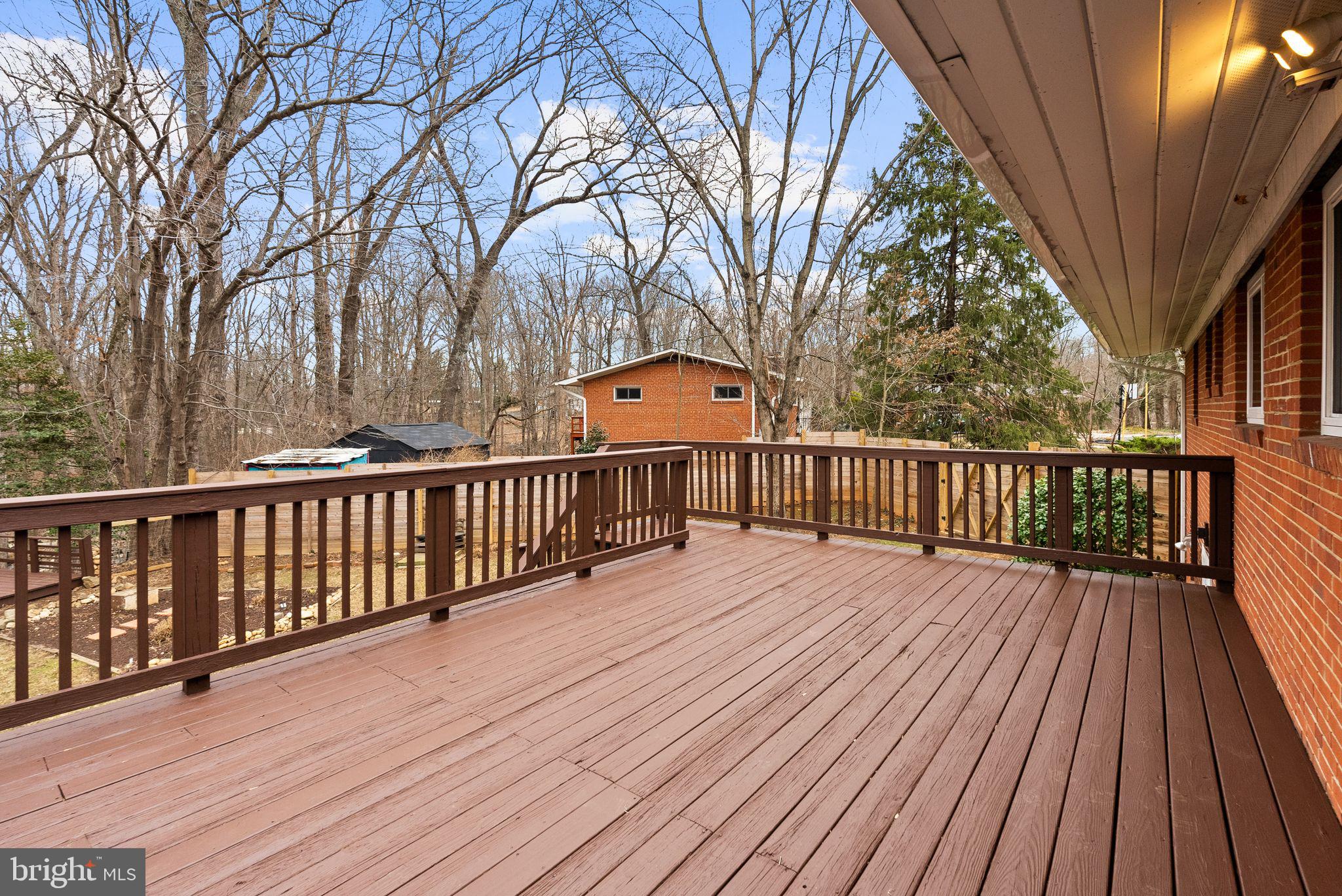7405 Add Drive Falls Church, VA 22042 - Photo 50 of 74 a view of deck with wooden floor and fence