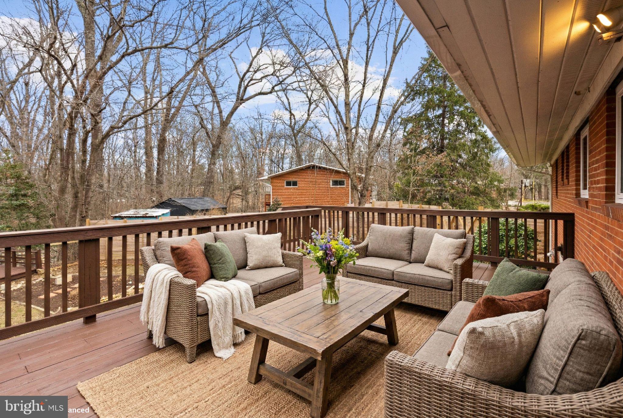 7405 Add Drive Falls Church, VA 22042 - Photo 51 of 74 a roof deck with couches and potted plants