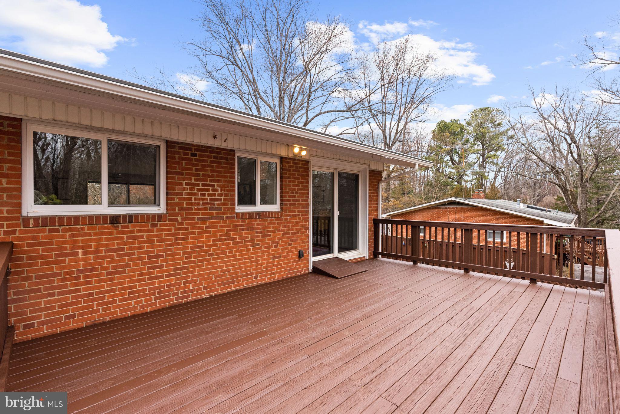 7405 Add Drive Falls Church, VA 22042 - Photo 52 of 74 a view of a house with a deck