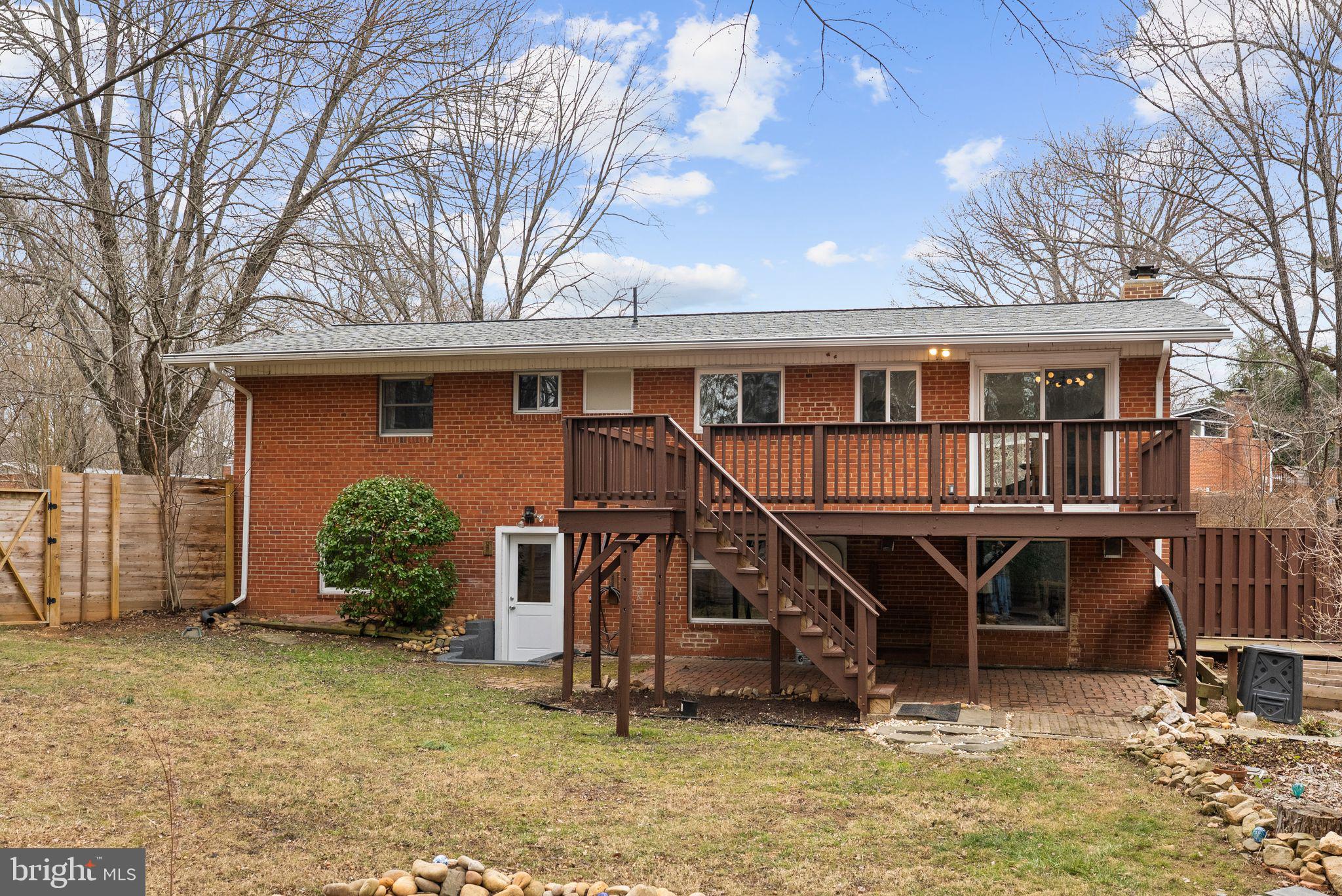 7405 Add Drive Falls Church, VA 22042 - Photo 63 of 74 a house with lots of trees in the background