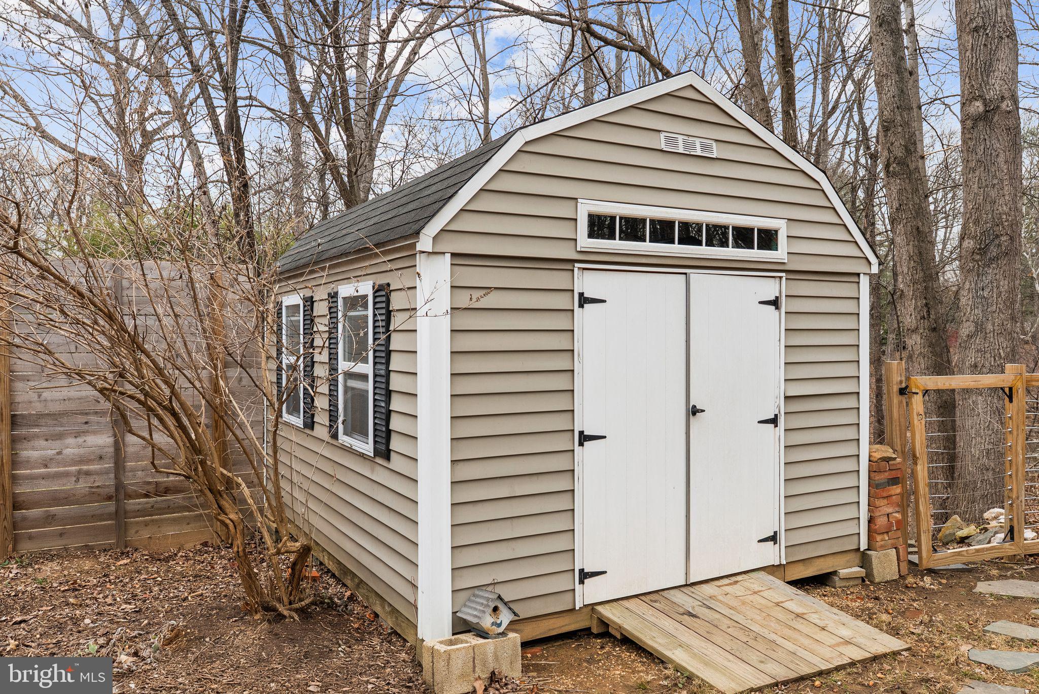 7405 Add Drive Falls Church, VA 22042 - Photo 66 of 74 a front view of a house with a yard