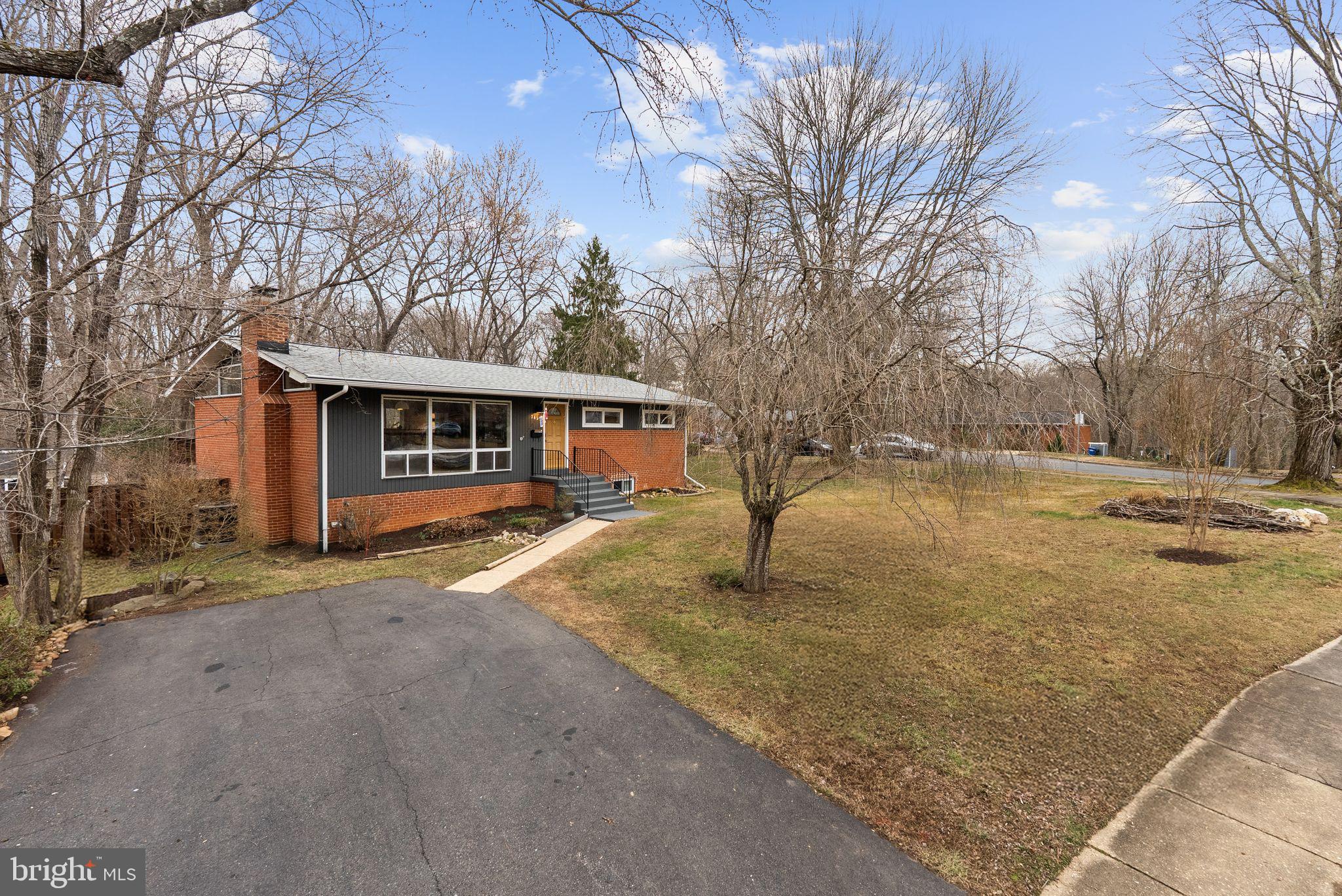 7405 Add Drive Falls Church, VA 22042 - Photo 69 of 74 a front view of a house with a yard