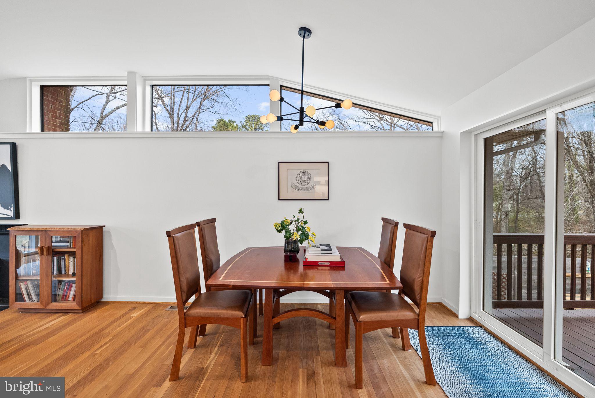 7405 Add Drive Falls Church, VA 22042 - Photo 9 of 74 a view of a dining room with furniture window and wooden floor