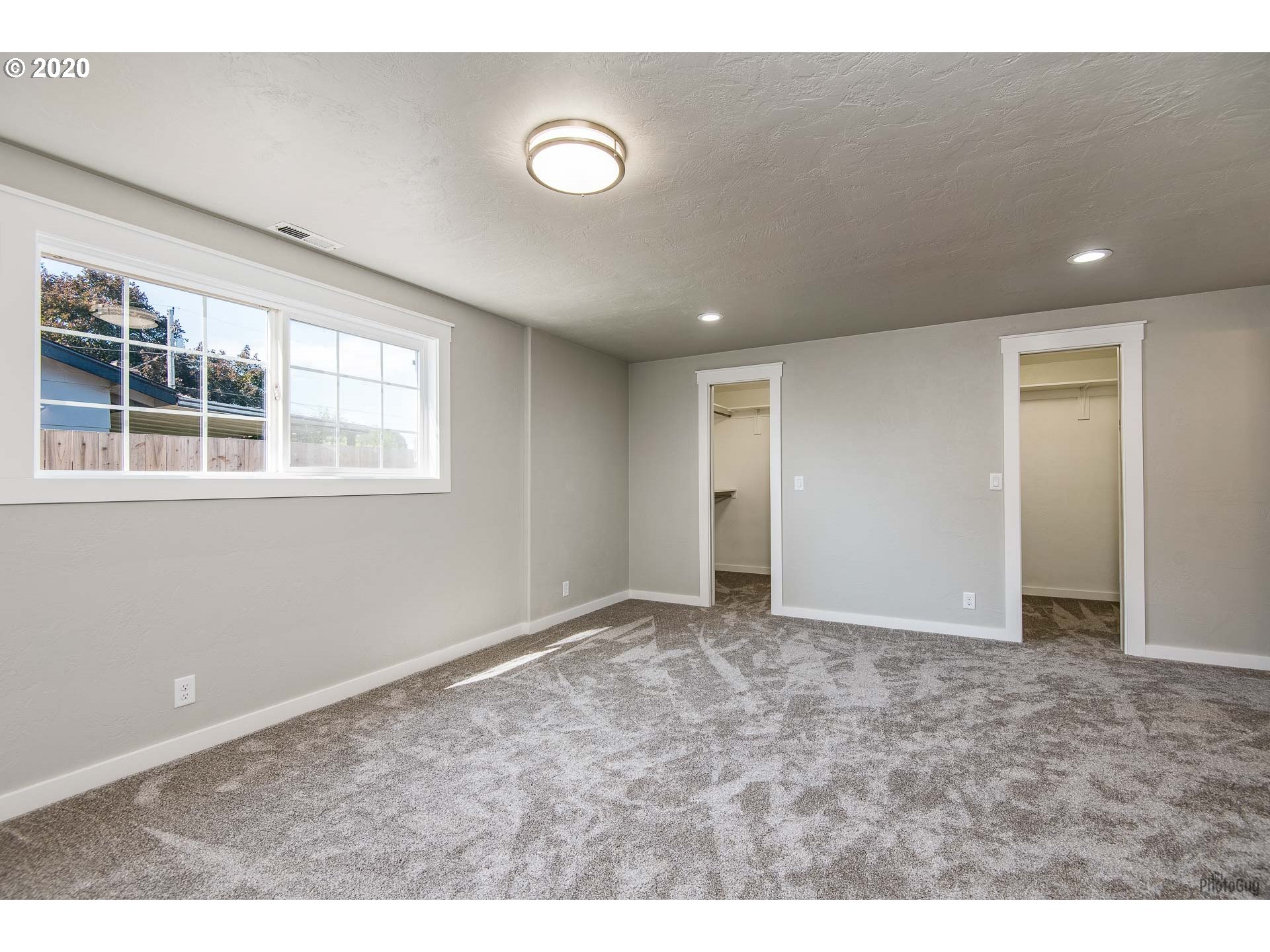 2470 North 14th Place Springfield, OR 97477 - Photo 17 of 32 a view of an empty room with a window