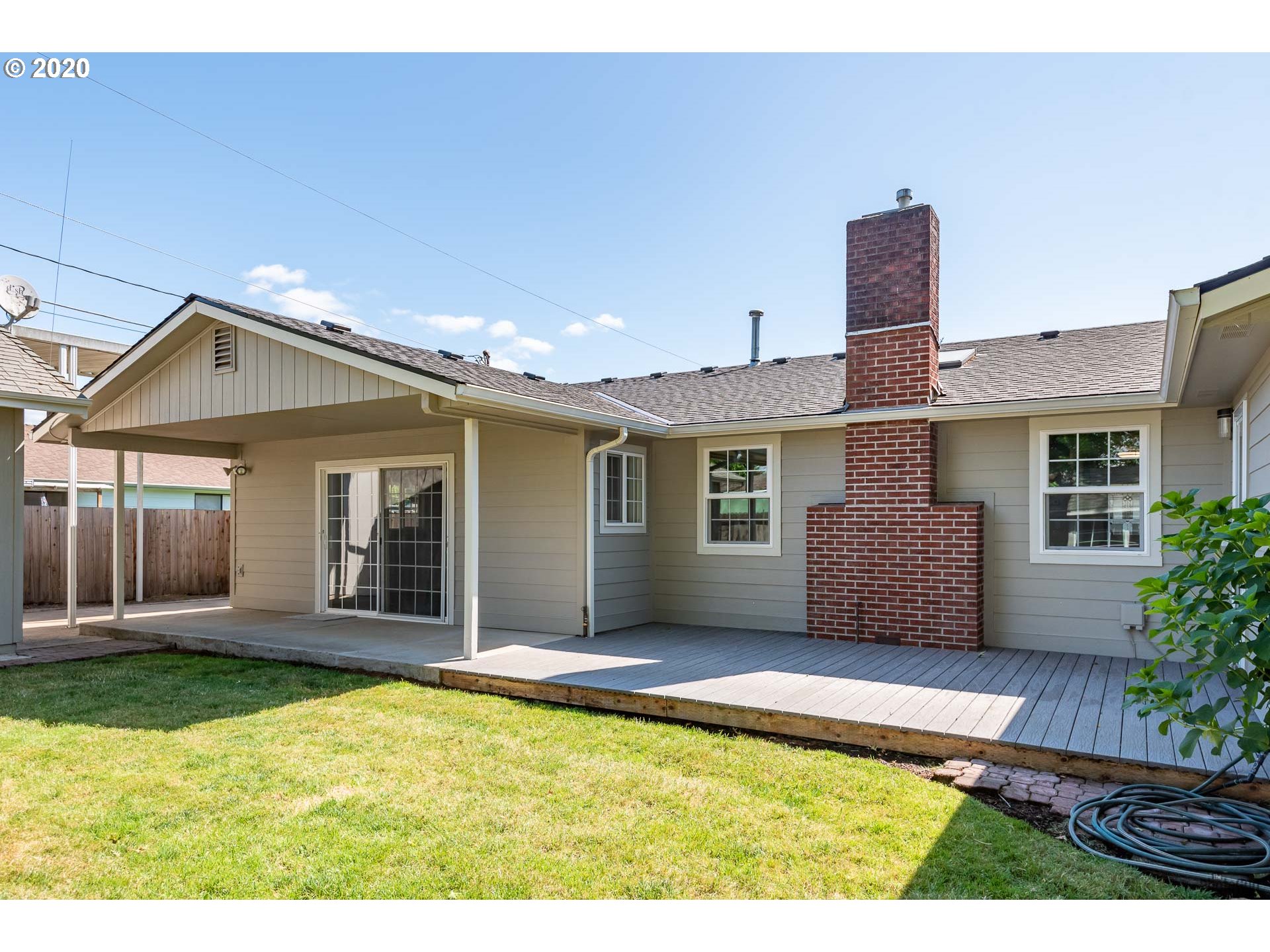 2470 North 14th Place Springfield, OR 97477 - Photo 30 of 32 a view of a house with a yard