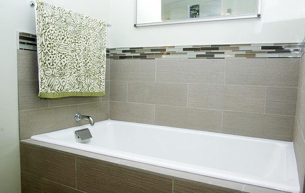 110 Stuart Street, Unit 23G Boston, MA 02116 - Photo 11 of 14 a bathroom with a sink and a bathtub