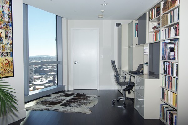 110 Stuart Street, Unit 23G Boston, MA 02116 - Photo 4 of 14 a view of a workspace with furniture and a window