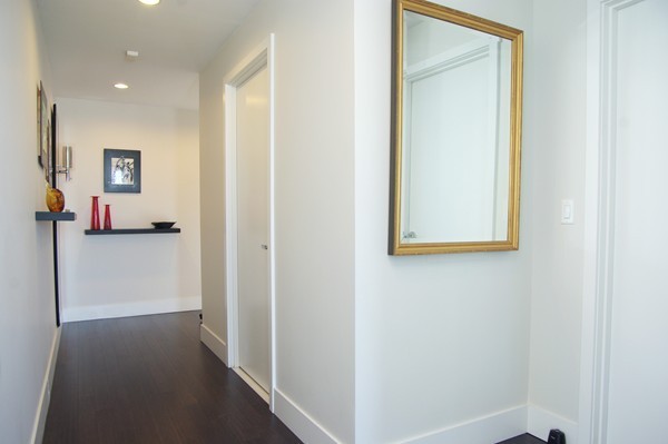 110 Stuart Street, Unit 23G Boston, MA 02116 - Photo 7 of 14 a view of a hallway with closet