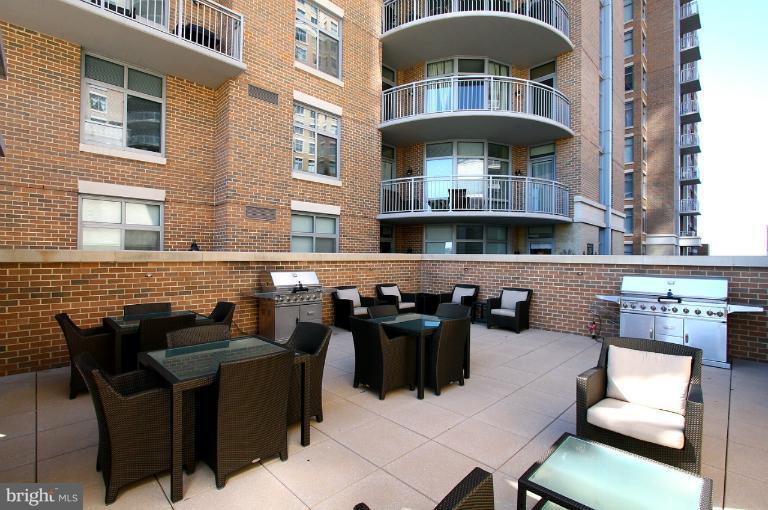 11990 Market Street, Unit 1607 Reston, VA 20190 - Photo 2 of 28 Outdoor Terrace (with grill)