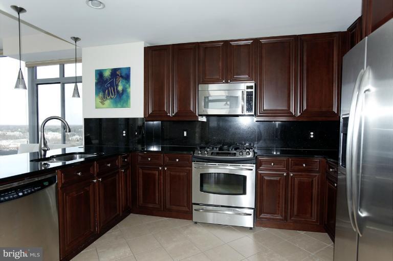 11990 Market Street, Unit 1607 Reston, VA 20190 - Photo 7 of 28 Gourmet Kitchen (cherry cabinets & granite)