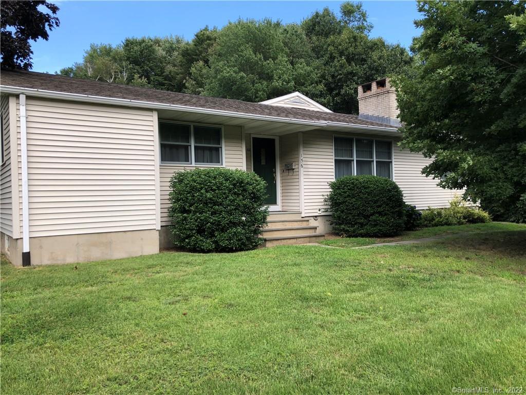 136 Ardsley Road Waterbury, CT 06708 - Photo 1 of 1 a front view of a house with a garden