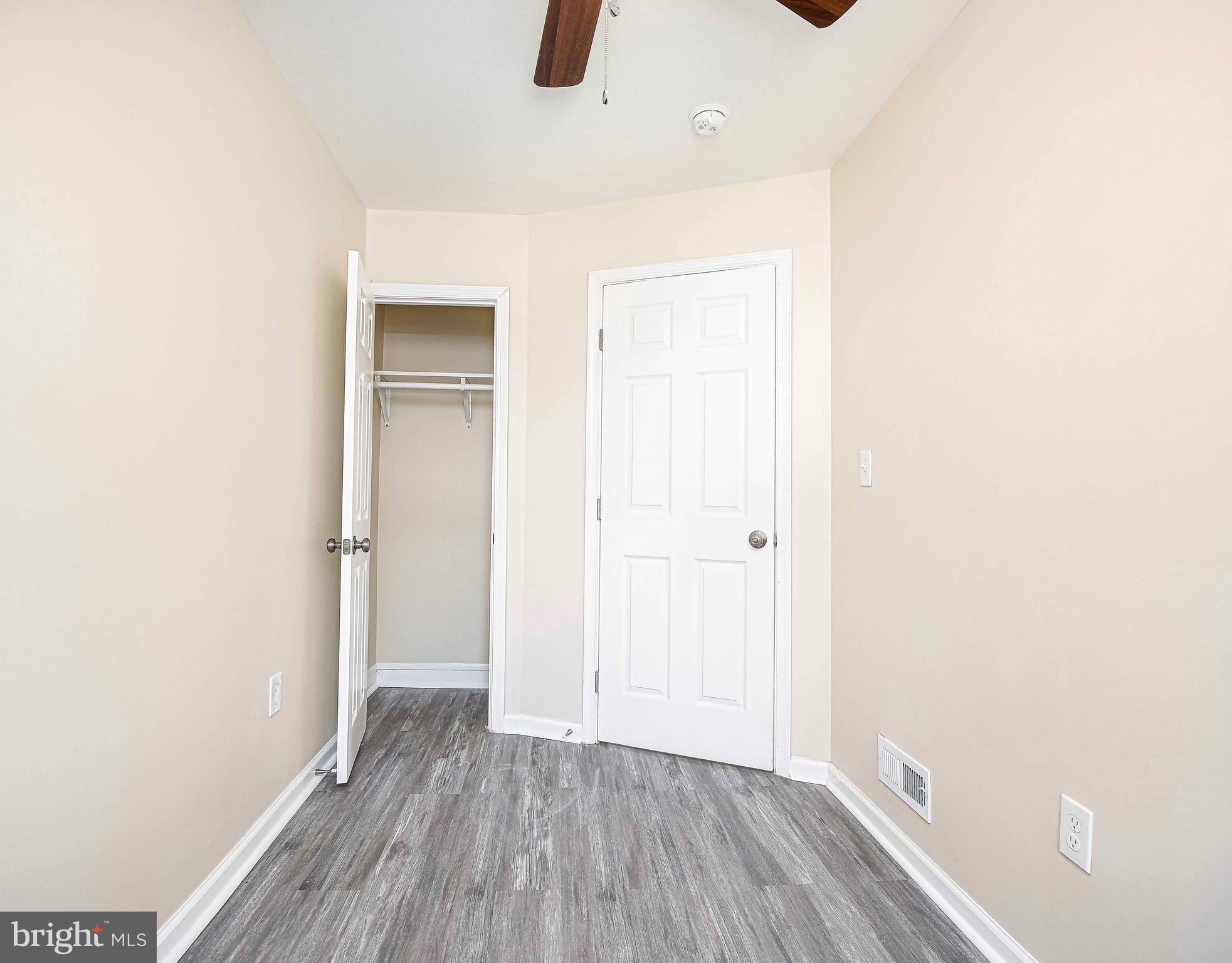 5332 Cuthbert Avenue Baltimore, MD 21215 - Photo 17 of 33 a view of an empty room with closet and a window