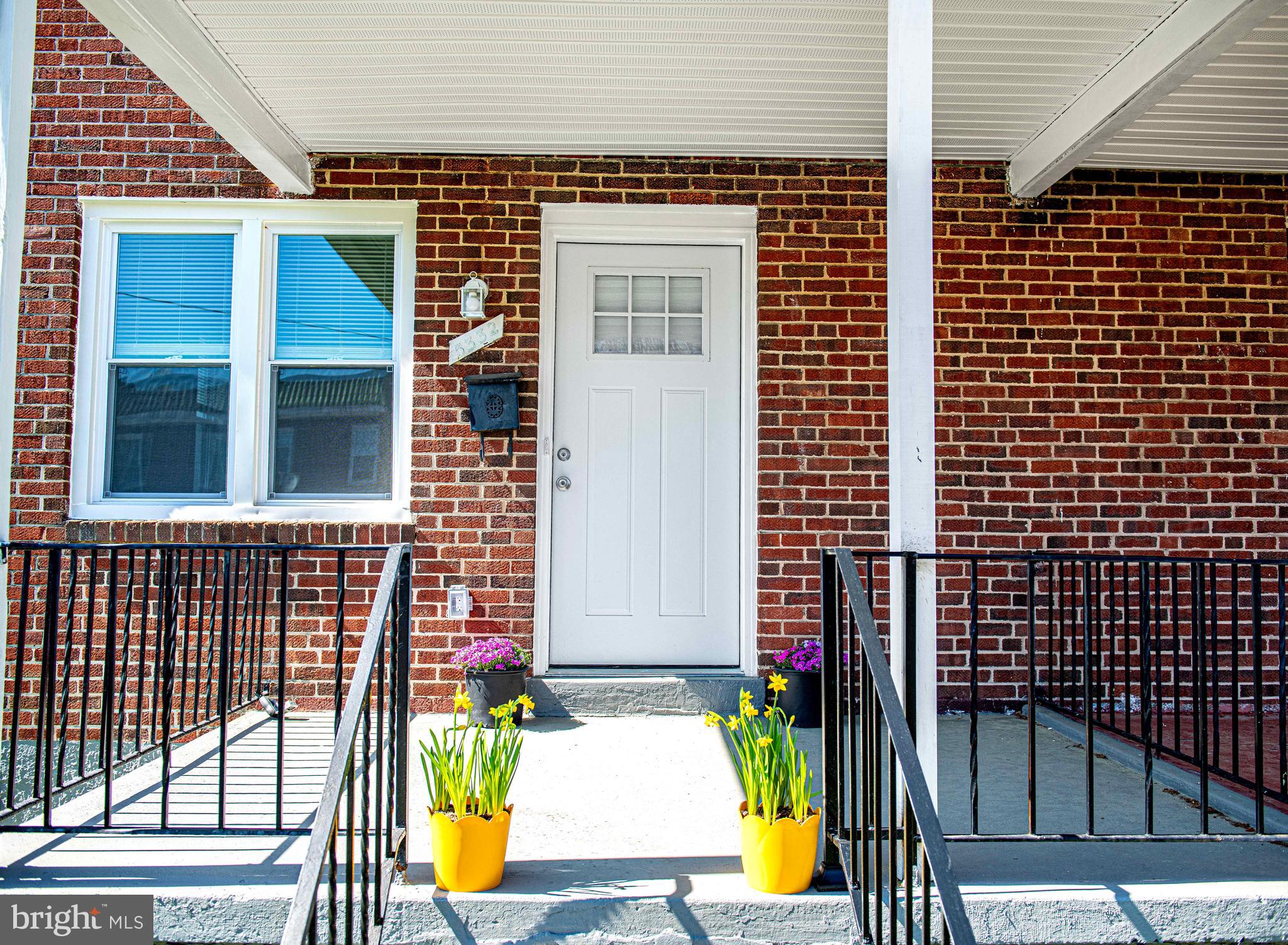 5332 Cuthbert Avenue Baltimore, MD 21215 - Photo 27 of 33 a view of building with door