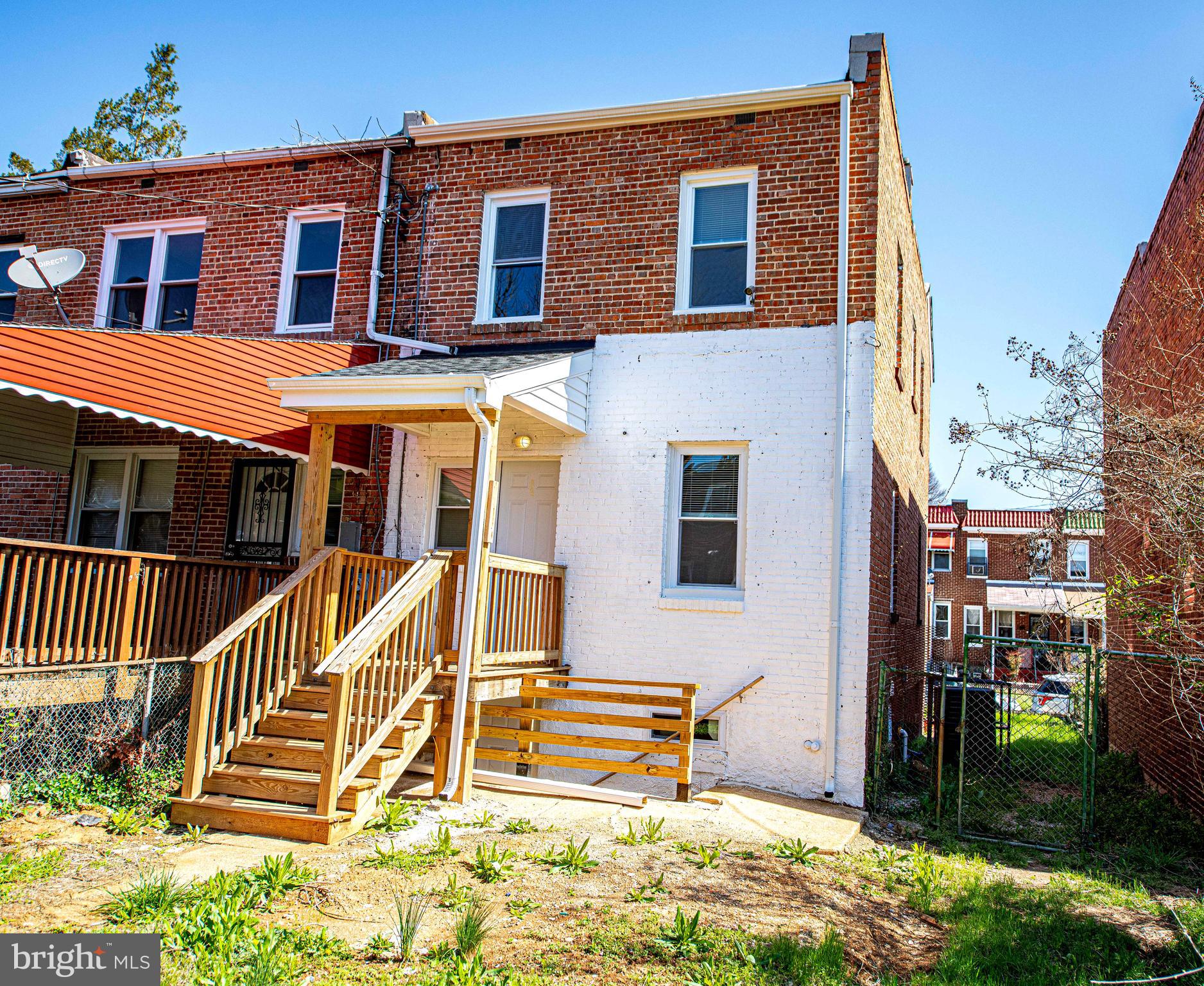 5332 Cuthbert Avenue Baltimore, MD 21215 - Photo 30 of 33 a view of a house with a small yard and wooden floor and fence