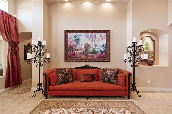 a bedroom with a bed and a couch