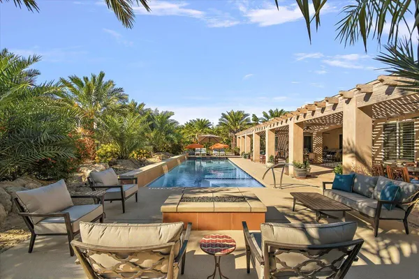 a outdoor space with patio furniture and a potted plant