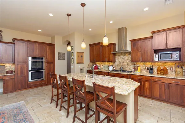 a bathroom with a toilet a sink and a mirror