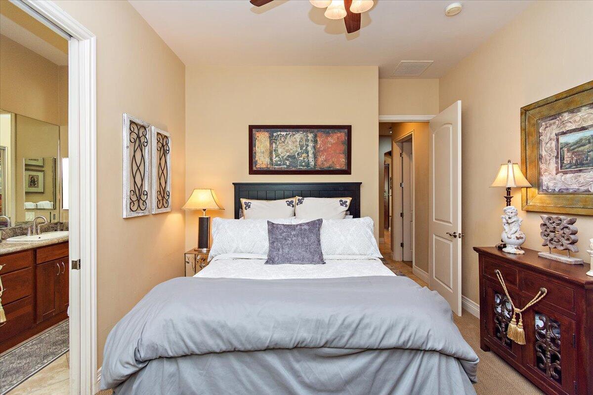 31453 Chimayo Road Thousand Palms, CA 92276 - Photo 38 of 71 a bedroom with a bed and wooden floor