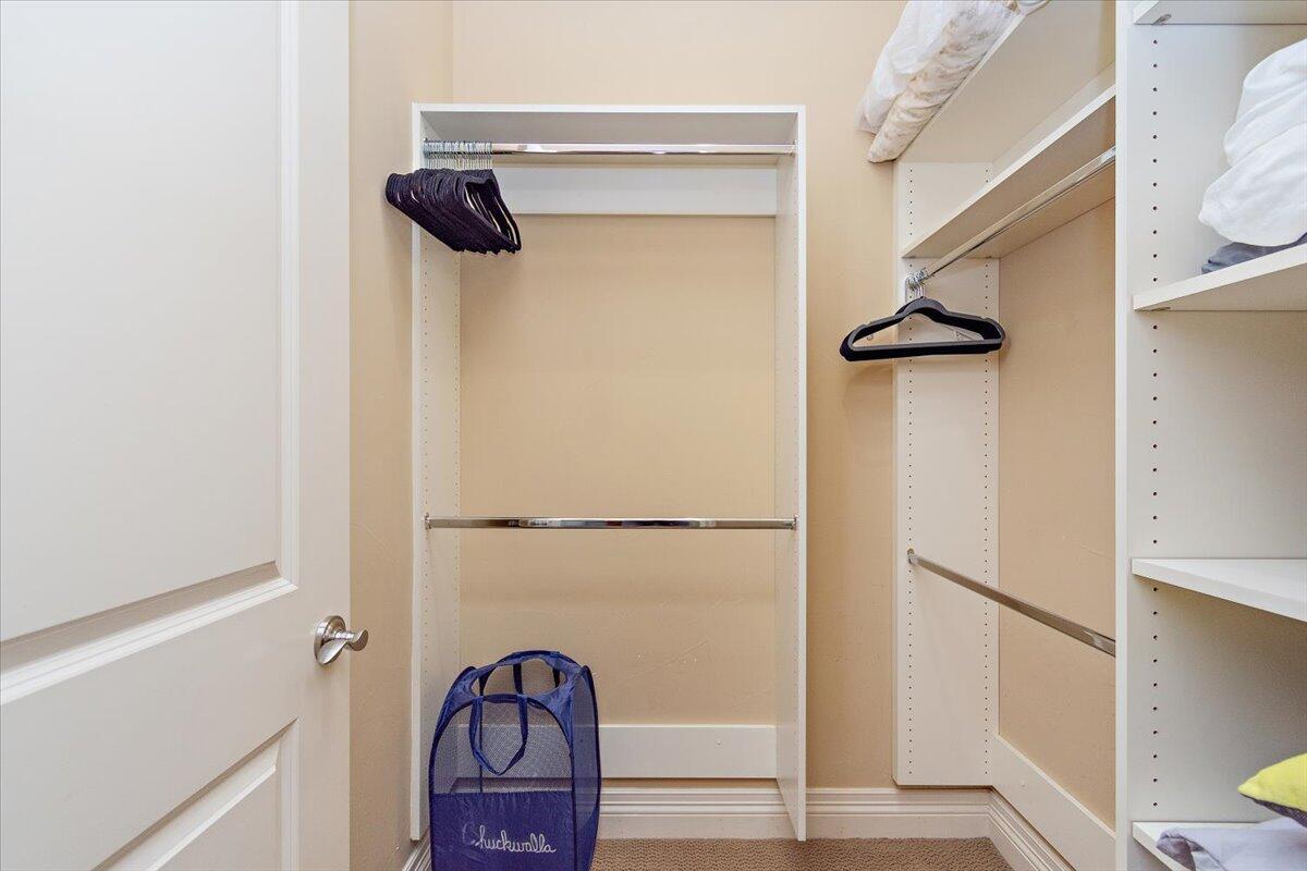 31453 Chimayo Road Thousand Palms, CA 92276 - Photo 39 of 71 a view of walk in closet with clothes and shoes