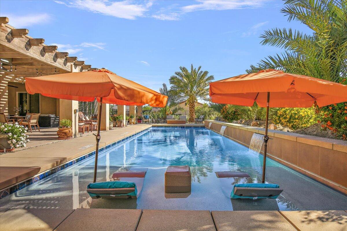 31453 Chimayo Road Thousand Palms, CA 92276 - Photo 4 of 71 swimming pool view with a seating space