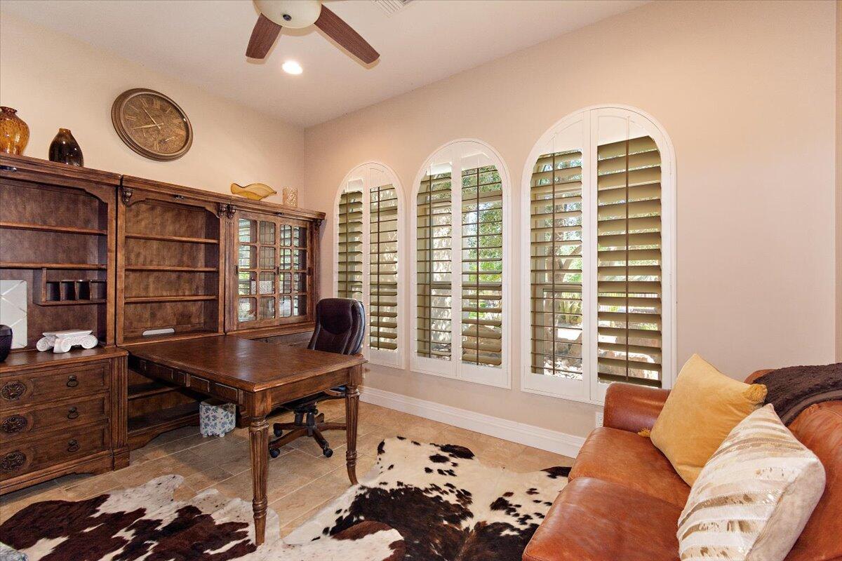 31453 Chimayo Road Thousand Palms, CA 92276 - Photo 42 of 71 a living room with furniture and a window