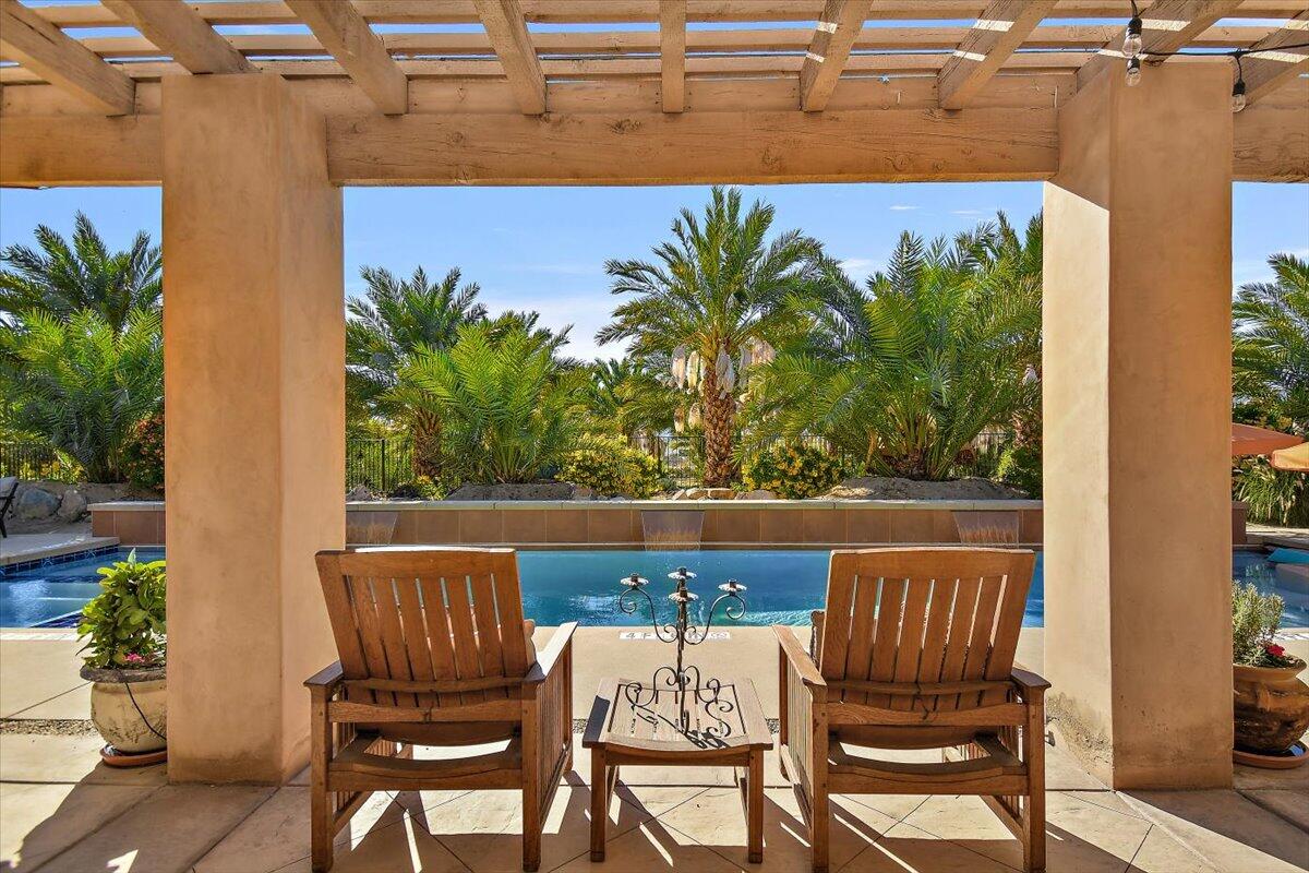 31453 Chimayo Road Thousand Palms, CA 92276 - Photo 44 of 71 a view of a chairs and table in the patio