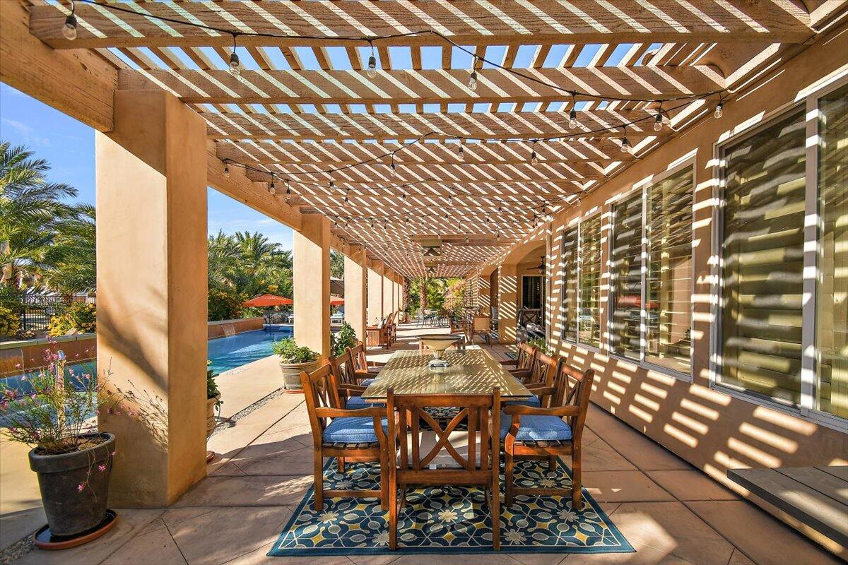31453 Chimayo Road Thousand Palms, CA 92276 - Photo 49 of 71 a view of a dining room with furniture and window