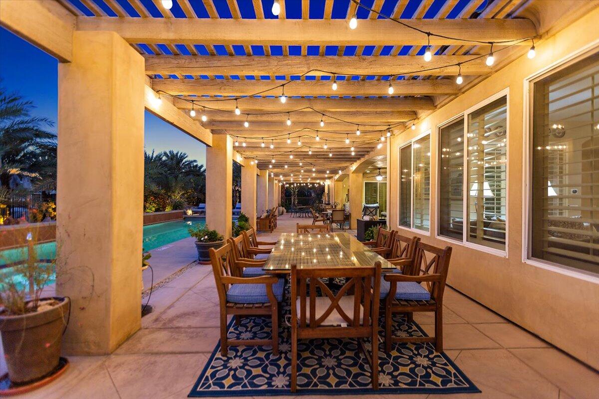 31453 Chimayo Road Thousand Palms, CA 92276 - Photo 50 of 71 a view of a dining room with furniture window and outside view