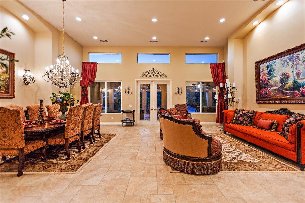 31453 Chimayo Road Thousand Palms, CA 92276 - Photo 6 of 71 a living room with fireplace furniture and a large window