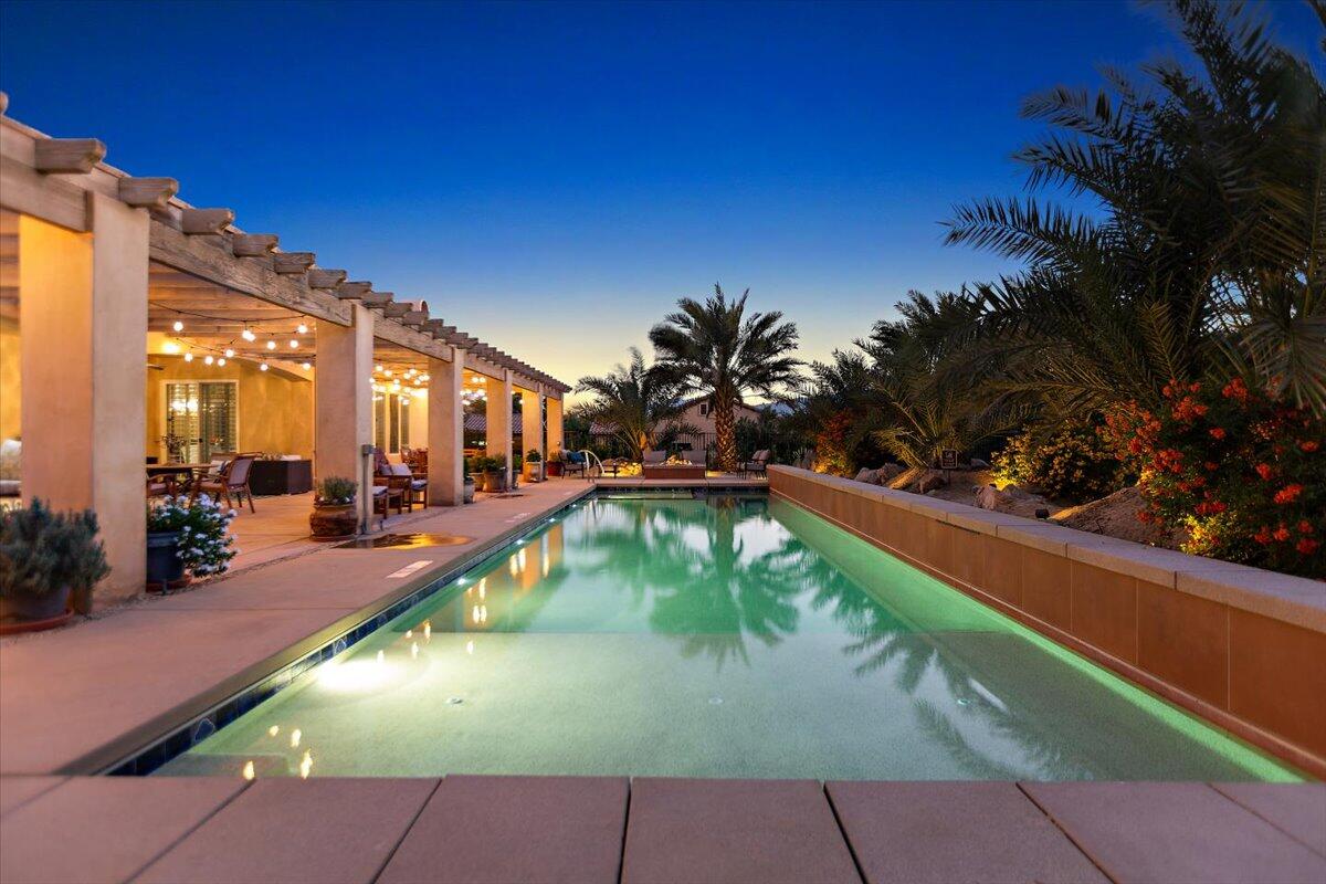 31453 Chimayo Road Thousand Palms, CA 92276 - Photo 63 of 71 a swimming pool with outdoor seating and yard