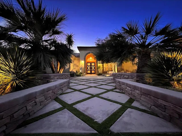 a view of a livingroom with furniture and a potted plant